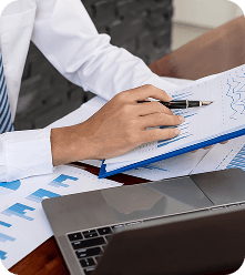 Digital growth visualization with hand holding glowing chart